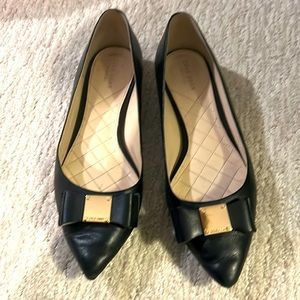 Cole Haan black flats with gold label